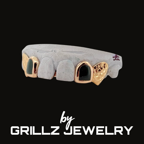 Gray and gold grill with 'by Grillz Jewelry' text on a black background