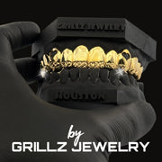 Gold grill on a black background with 'Grillz Jewelry' branding.