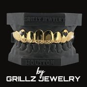 Diamond-studded grillz on a stand with 'Grillz Jewelry' branding.