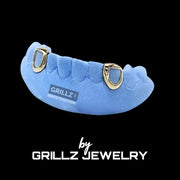 Gold grillz with a flawless fit, tailored to give you a confident and stylish look.
