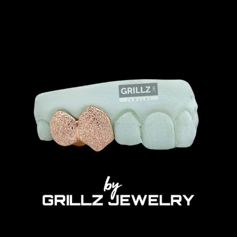 Experience luxury with our custom-made grillz, designed for a perfect fit and flawless finish.
