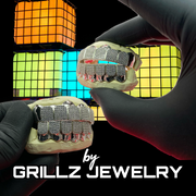 Unique gold grillz, crafted to add a bold and distinctive touch to your look.
