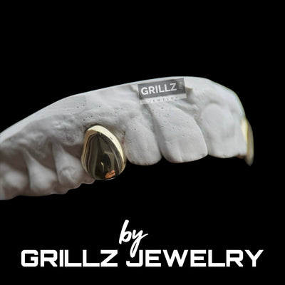 Elevate your style with our high-quality gold grillz, designed for durability and shine
