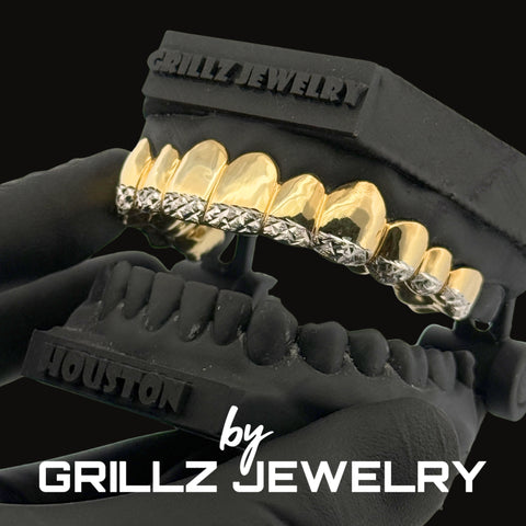 Grillz jewelry set on a black stand with 'Grillz Jewelry' branding.