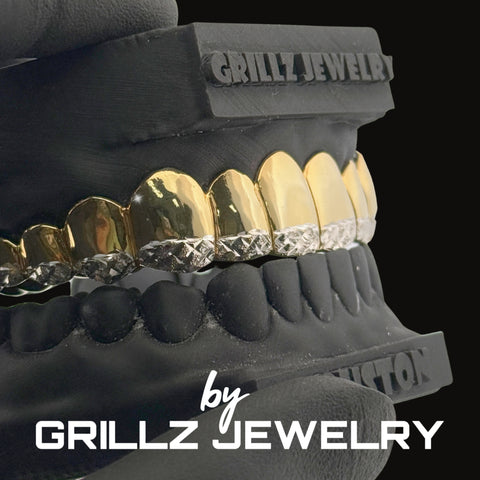 Silver grillz jewelry held by a gloved hand with 'Grillz Jewelry' branding.