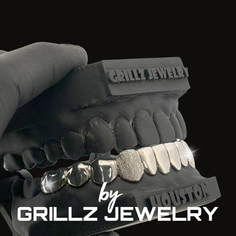 Grillz jewelry set with 'Grillz Jewelry' branding on a black background