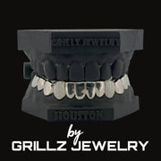 Grillz jewelry set on a black background with 'Grillz Jewelry' branding.