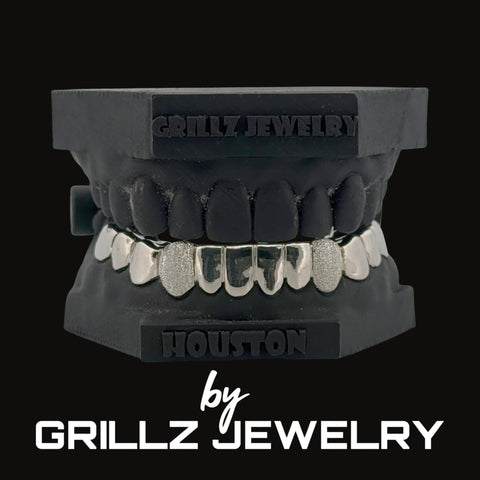 Grillz jewelry set on a black background with 'Grillz Jewelry' branding.