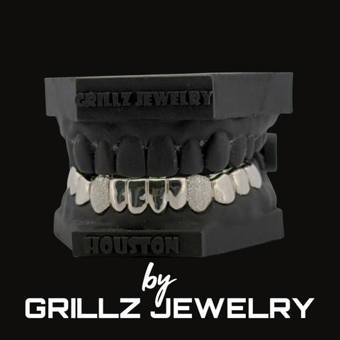 Grillz jewelry set on a black background with 'Grillz Jewelry' branding.