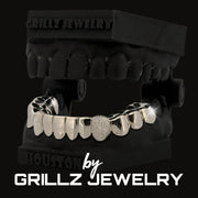 Grillz jewelry set on a black background with 'Grillz Jewelry' branding.