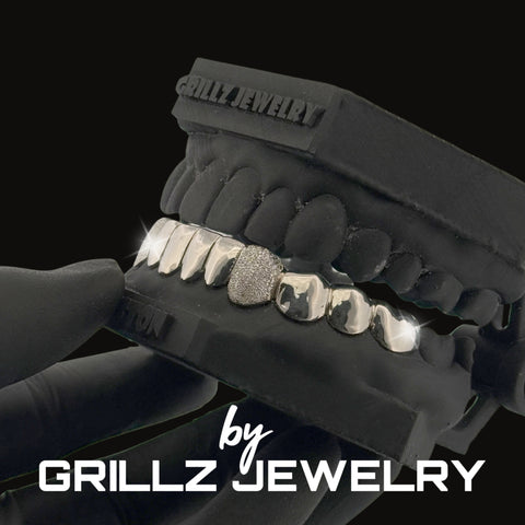 Grillz jewelry set with 'Grillz Jewelry' branding on a black background