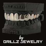 Grillz jewelry set on a black background with 'Grillz Jewelry' branding.