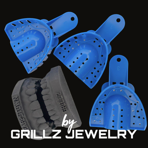 Blue and gray grill cleaners with 'GRILLZ JEWELRY' branding on a black background