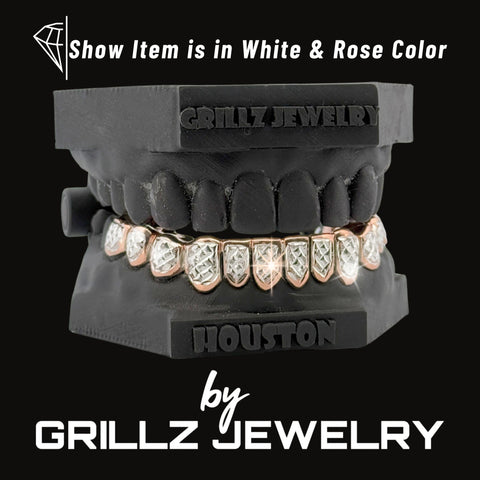 Grillz jewelry set on a black stand with 'Houston' branding, displayed by Grillz Jewelry.