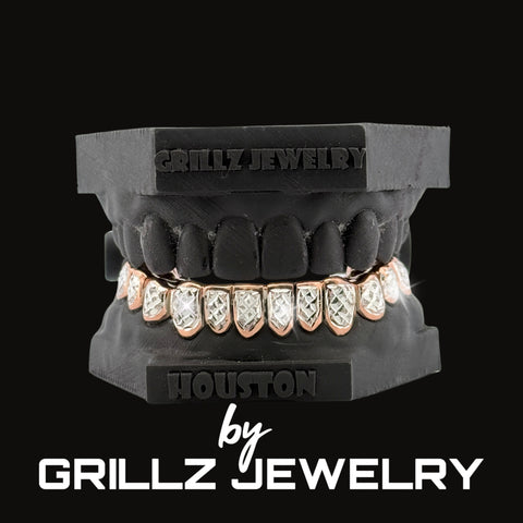 Grillz jewelry set on a black stand with 'Grillz Jewelry' branding.
