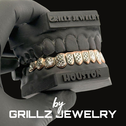 Grillz jewelry set held by a gloved hand with 'Grillz Jewelry' branding.