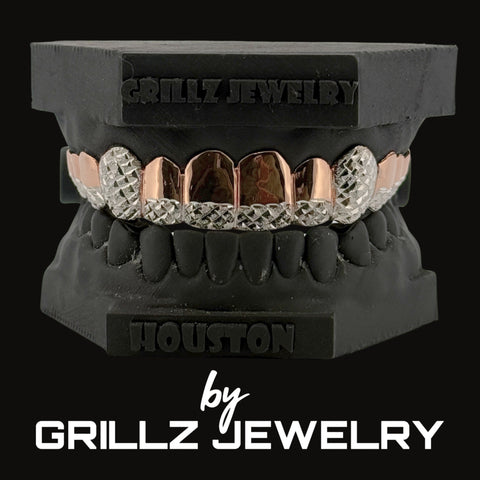 Grillz jewelry set on a black stand with 'Grillz Jewelry' branding.