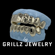 Elevate your style with our high-quality gold grillz, designed for durability and shine
 