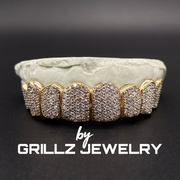 Handcrafted gold grillz that elevate your personal style with a touch of luxury.
